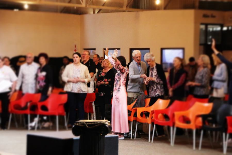 Raised hands during worship